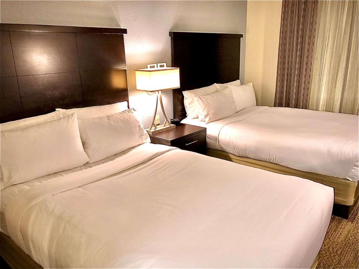 Two-Bedroom Suite with Queen and Two Double Beds